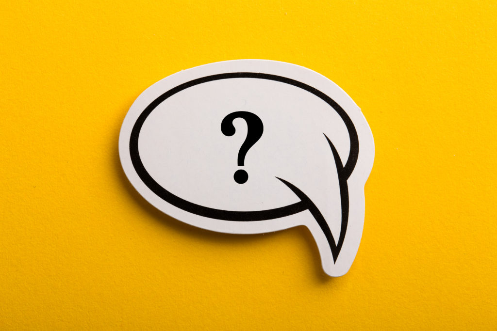 how to take sharp photos continuous shutter - question mark in a speech bubble on yellow background
