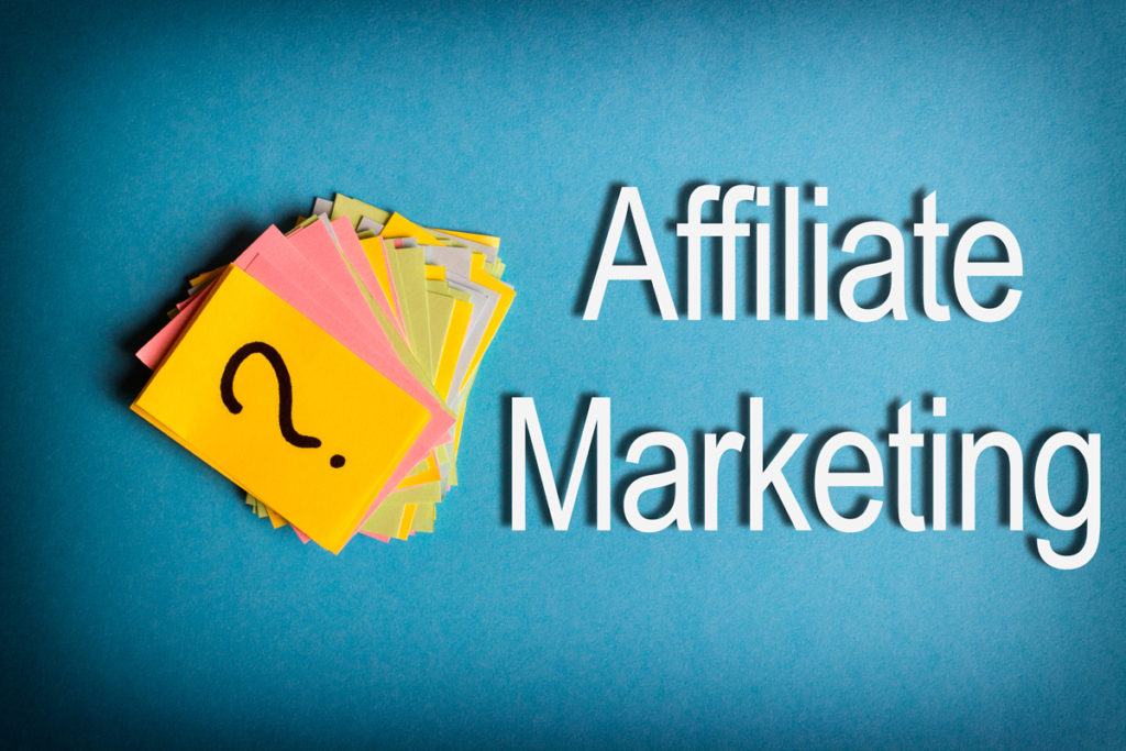 pile of sticky notes with a question mark written on them next to text that says affiliate marketing