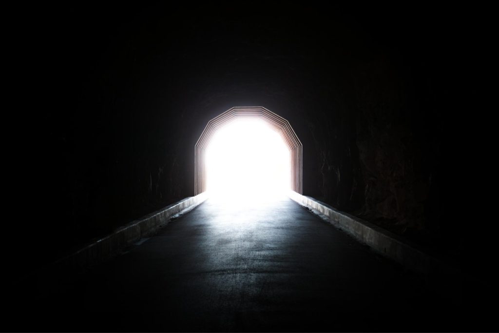 how to stop feeling depressed - a light at the end of a tunnel